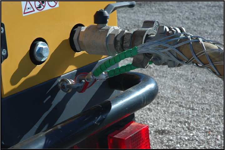 An Air Hose Connection to a Compressor with Restraining Device